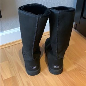 Tall black UGG boots